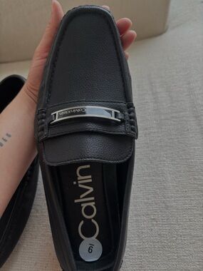 Calvin Klein Black Leather Slip-On Loafers with Silver Hardware